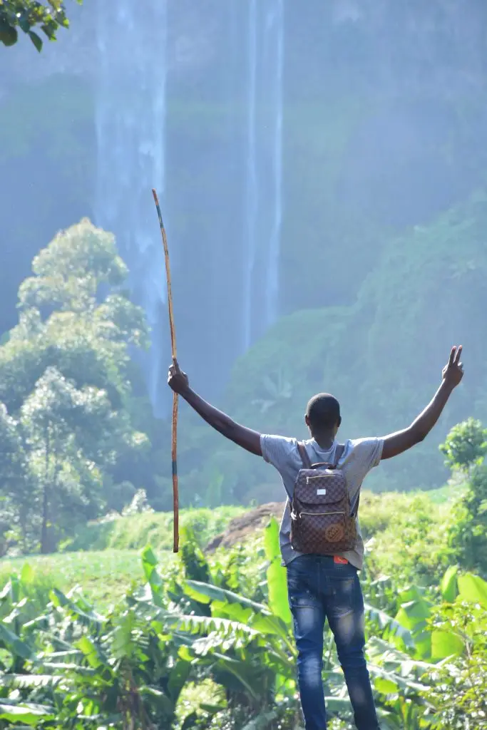 Local guide enjoying a Sipi Falls Hiking experience in eastern Uganda