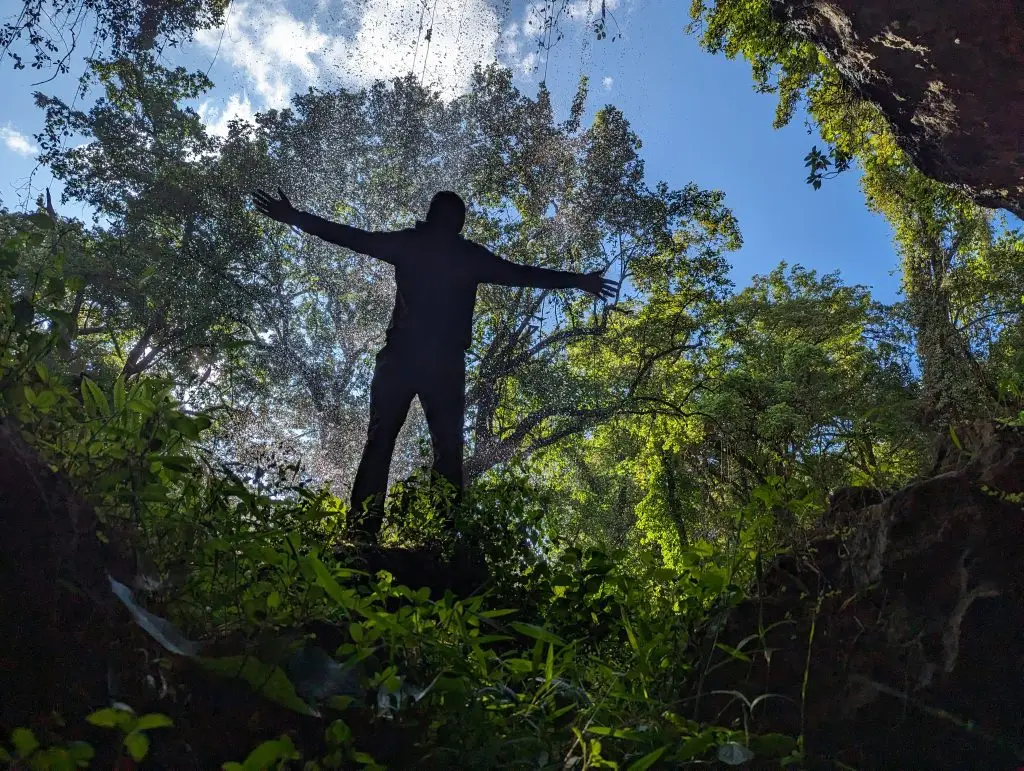 Hikers walking along the Sipi Trail during Mount Elgon Tutum Cave hiking experience