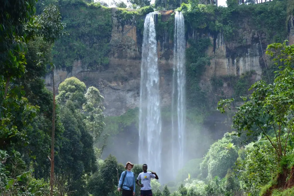 Travelers enjoying Sipi Falls hiking and coffee tour near Mount Elgon