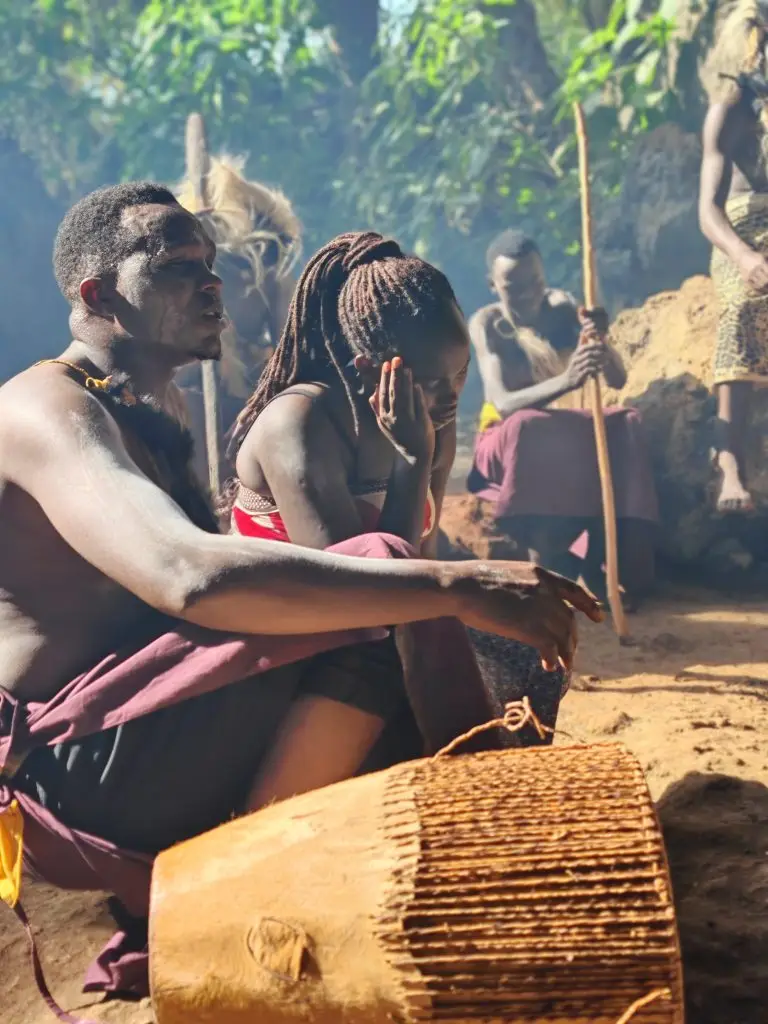 Sebei Cultural Experience in Sipi Falls Uganda Sebei cultural performers playing traditional drums during a storytelling a storytelling and dance experience in Sipi Falls, Mount Elgon, Uganda