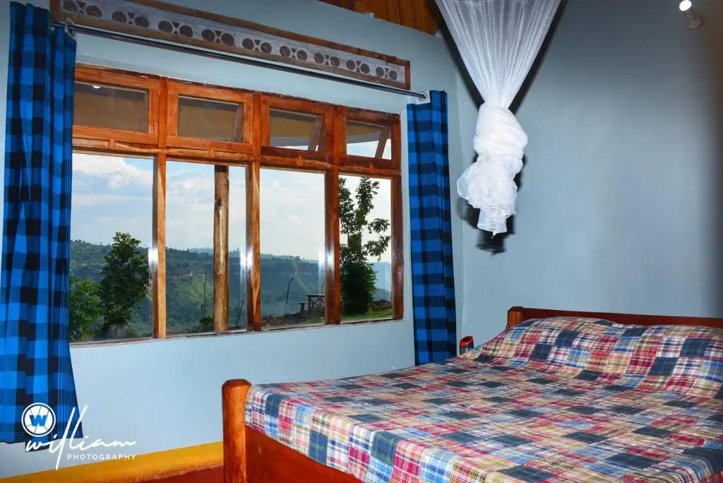 Kamorok Falls View Lodge cottage rooms overlooking the hanging valleys of the mount elgon ranges.